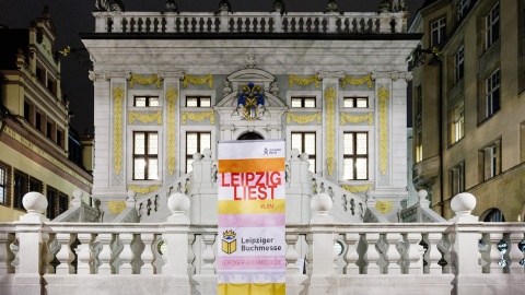 Exterior view of the Leipzig Reads location Alte Handelsbörse at night during the Leipzig Book Fair 2024