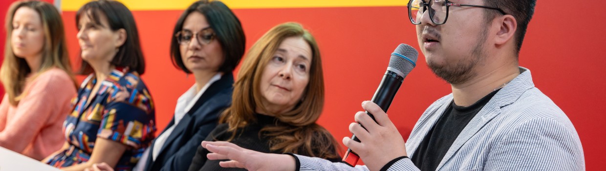 Stage discussion with 5 participants on the stage of the Forum International + Translation Center at the Leipzig Book Fair 2024