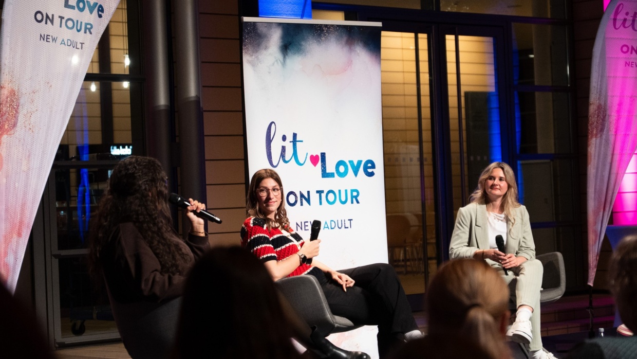 Stage discussion with three participants at lit love on tour during the Leipzig Book Fair 2025