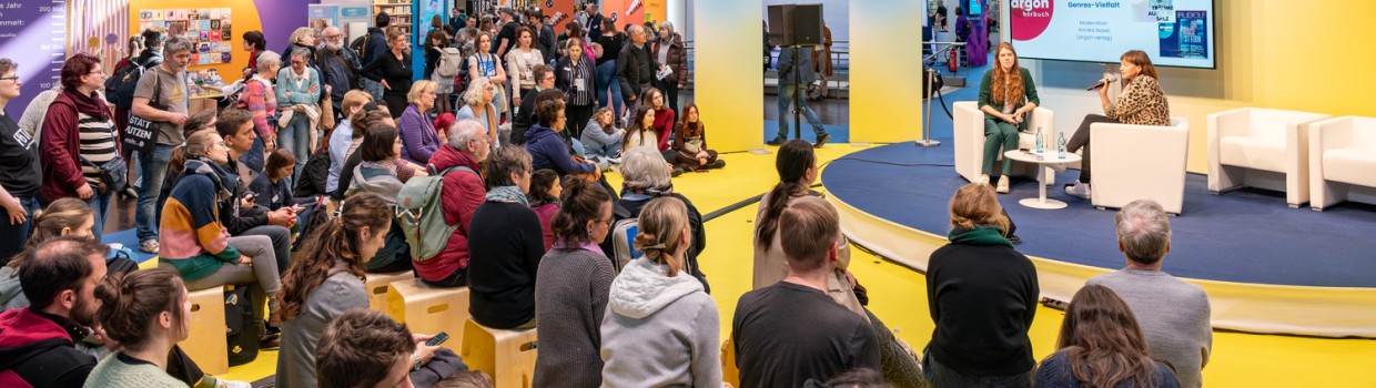 Event at the Audiwelt in front of a full audience during Leipziger Buchmesse 2026