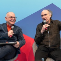 2 men talking on stage at the trade fair stand of the Focus Topic Danube at Leipzig Book Fair 2026