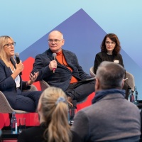 several participants talking on stage at the trade fair stand of the Focus Topic Danube at Leipzig Book Fair 2026